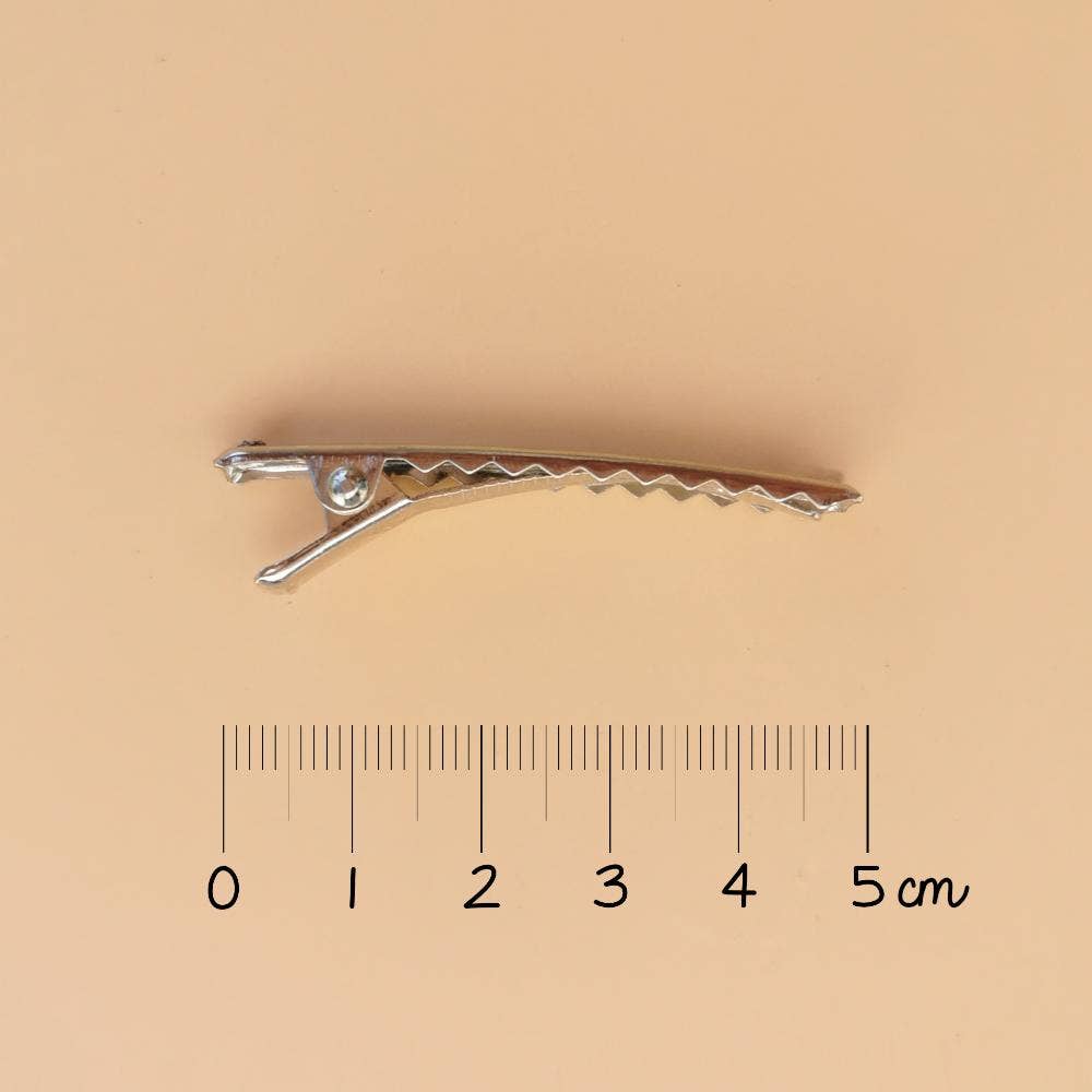 Haarclip met drie sterren - Gold glitter